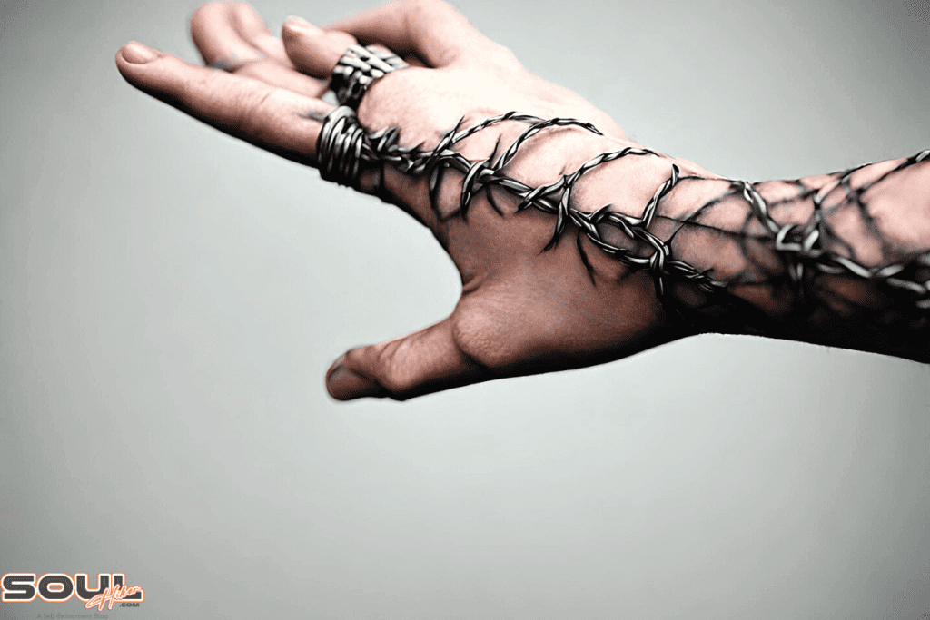 what does a barbed wire tattoo mean